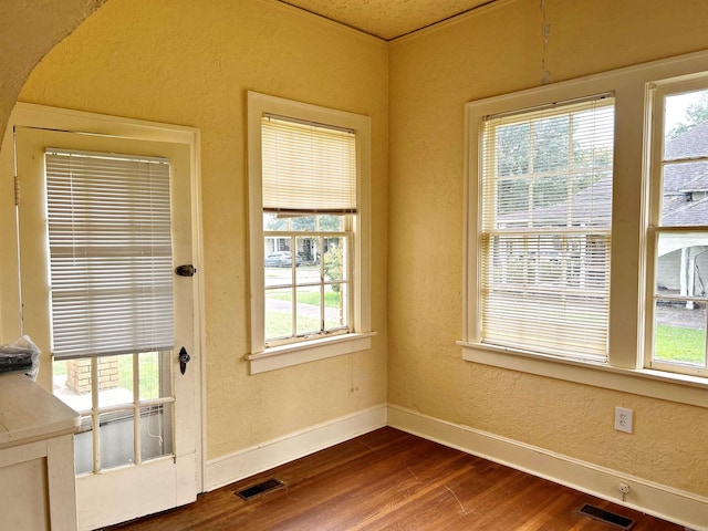 interior space with hardwood / wood-style flooring