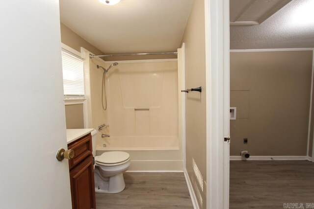 6 Fox Hill Rd, Greenbrier, AR 72058 - bathroom with vanity, shower / bathtub combination, toilet, baseboards, and wood finished floors