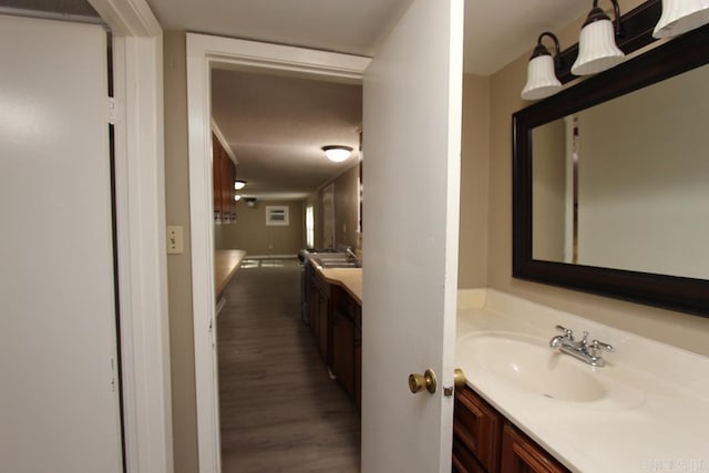 6 Fox Hill Rd, Greenbrier, AR 72058 - bathroom featuring wood finished floors and vanity