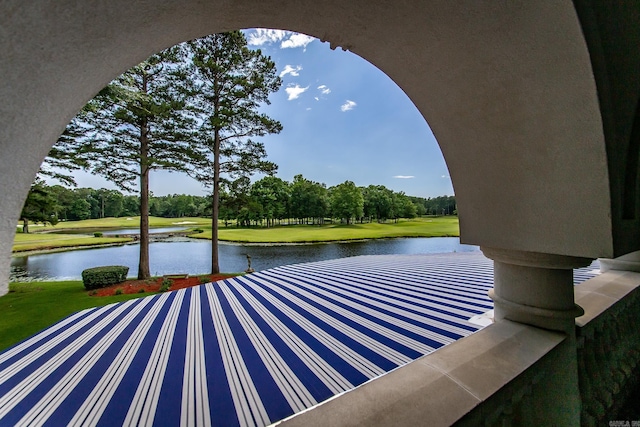 view of patio with a water view