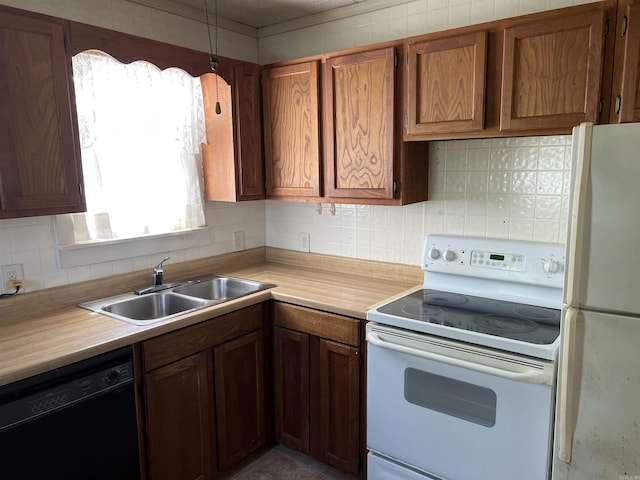 kitchen featuring white appliances, a sink, light countertops, backsplash, and brown cabinetry