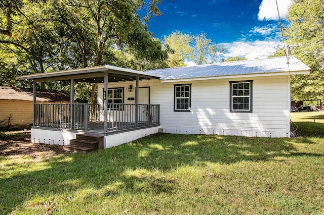 exterior space with a front lawn