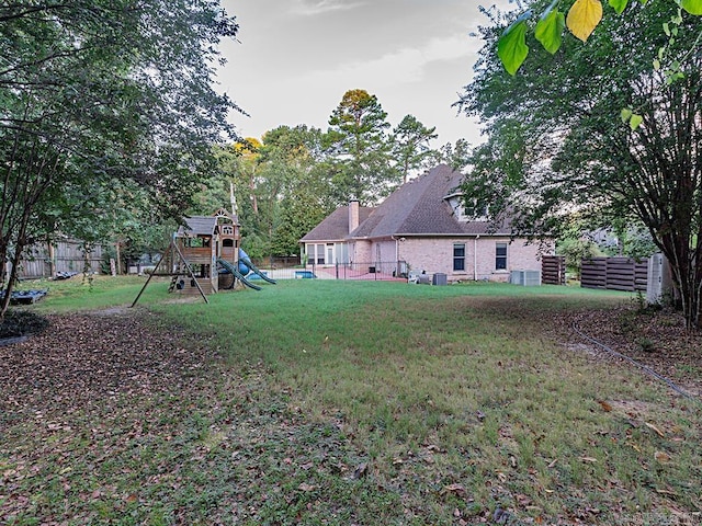 view of yard with a playground