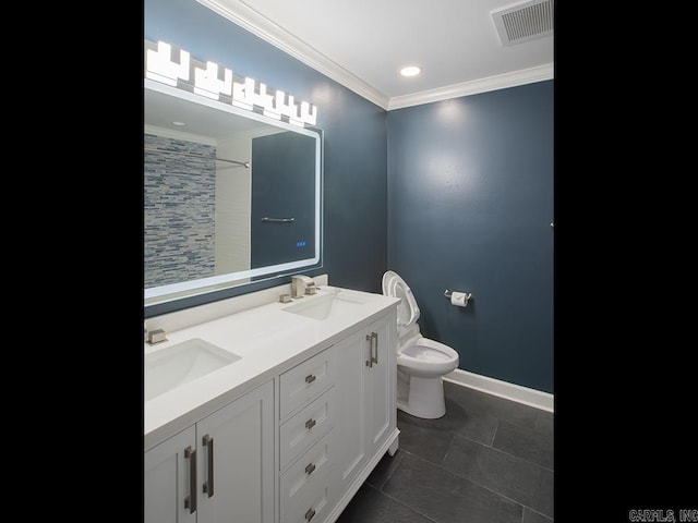 bathroom with crown molding, tile patterned floors, toilet, a tile shower, and vanity