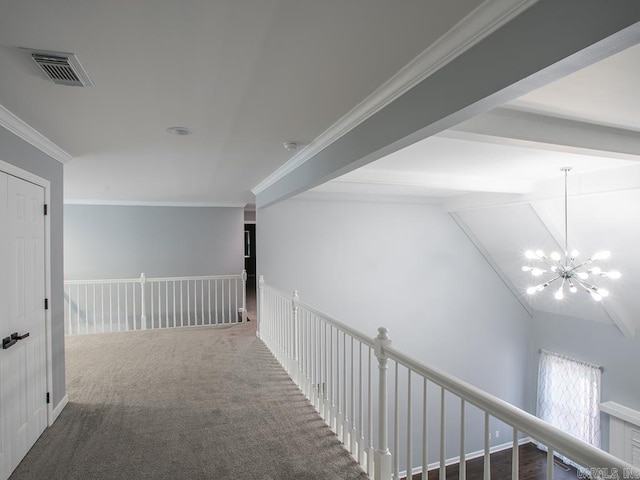 hallway with crown molding, an inviting chandelier, carpet floors, and lofted ceiling with beams