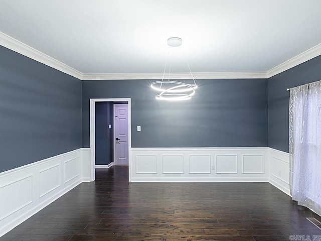 unfurnished dining area with crown molding, dark hardwood / wood-style flooring, and a chandelier