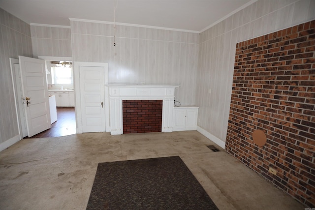 unfurnished living room featuring carpet and ornamental molding