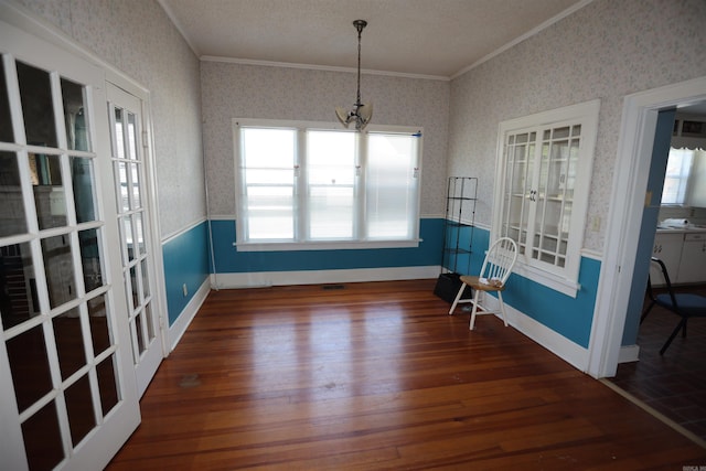 unfurnished sunroom with french doors