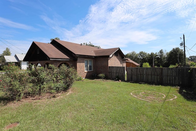 exterior space featuring a front lawn