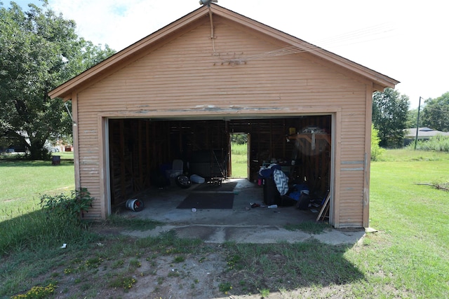 garage with a lawn