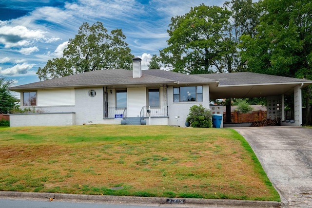 ranch-style home with a carport and a front yard