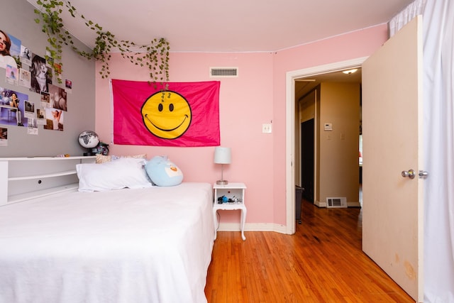 unfurnished bedroom featuring light hardwood / wood-style floors