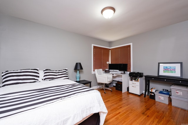 bedroom with light wood-type flooring