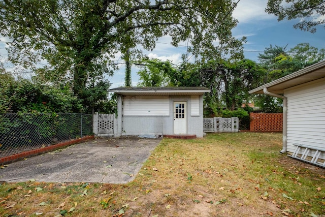 garage with a yard