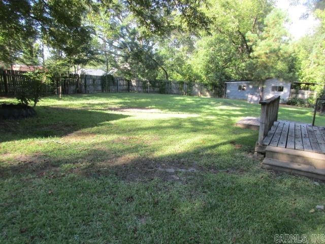 view of yard with a deck