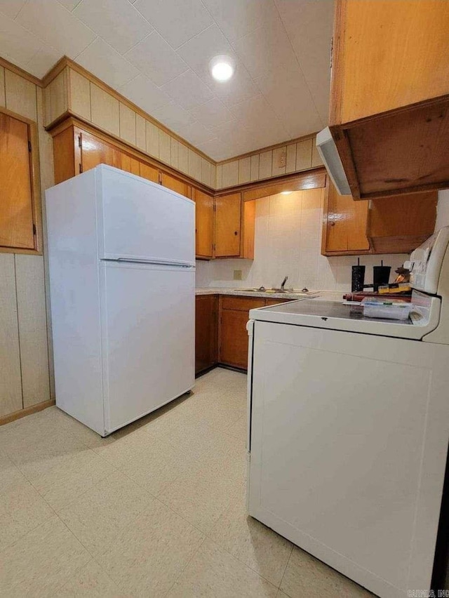 kitchen featuring white refrigerator