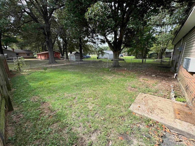 view of yard with a storage shed