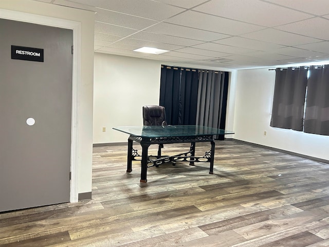 game room with a drop ceiling and hardwood / wood-style floors