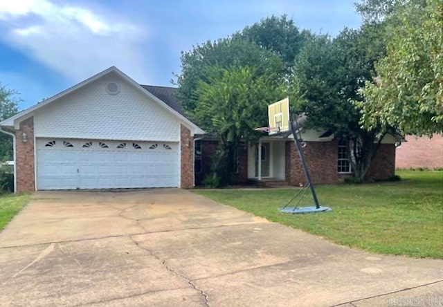 single story home with a garage and a front lawn