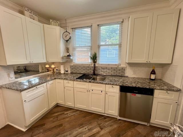 kitchen with stainless steel dishwasher, dark wood-type flooring, a sink, and white cabinetry