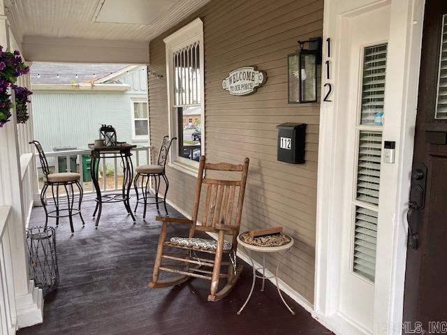 balcony featuring a porch