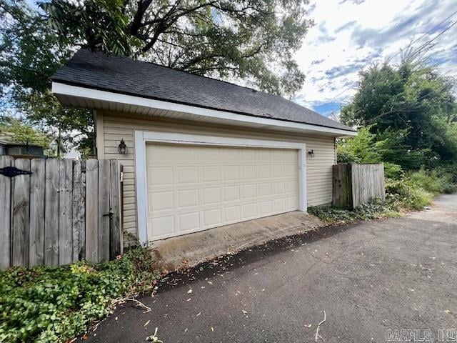 detached garage with fence