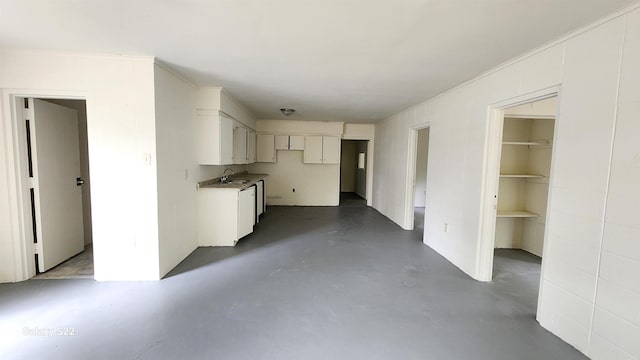 kitchen with sink and white cabinets