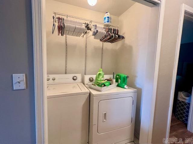 laundry room with independent washer and dryer