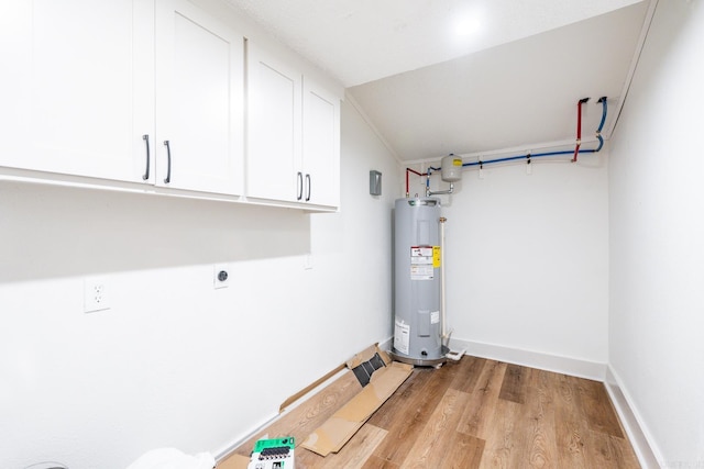 utility room with water heater