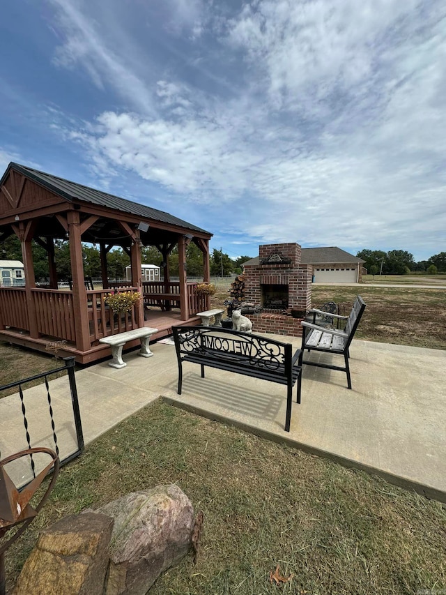 exterior space featuring a patio, a gazebo, and a lawn