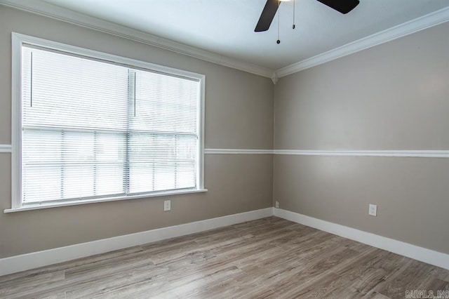 unfurnished room with ceiling fan, light hardwood / wood-style floors, and crown molding