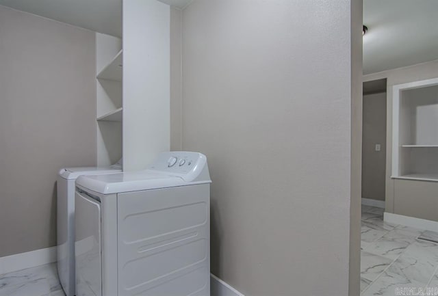 laundry area with washer and dryer