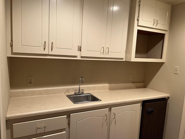 kitchen with white cabinets and sink