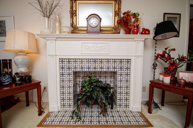 details featuring a tile fireplace