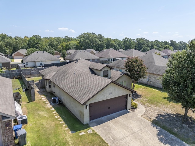 birds eye view of property with a residential view