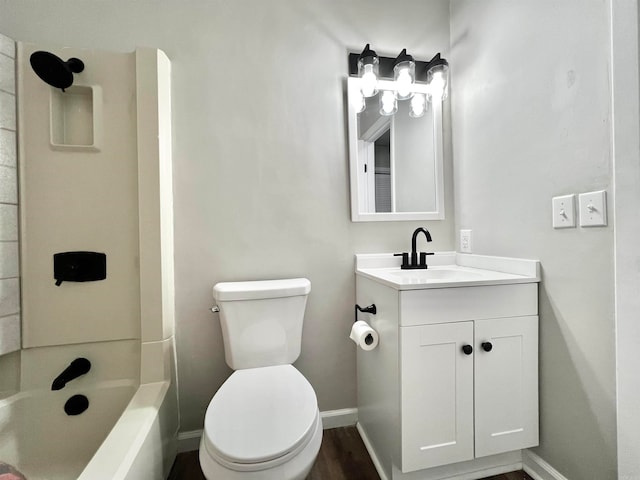 full bathroom with vanity, toilet, hardwood / wood-style flooring, and  shower combination