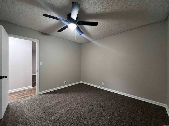 unfurnished room featuring a textured ceiling, ceiling fan, and carpet flooring