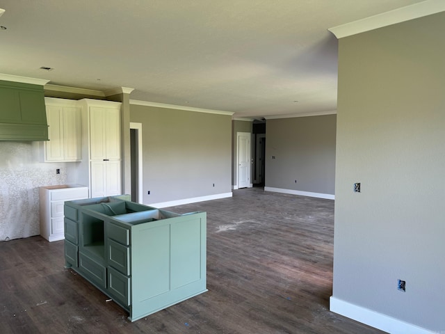 kitchen with crown molding and dark hardwood / wood-style floors