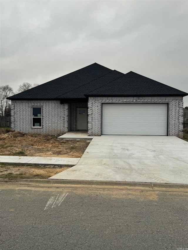 view of front of property featuring a garage