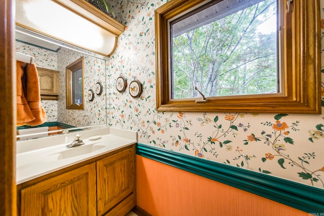 bathroom with vanity and a wealth of natural light