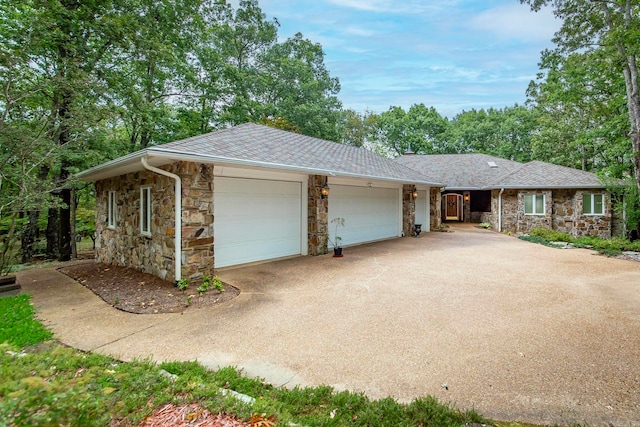 single story home featuring a garage