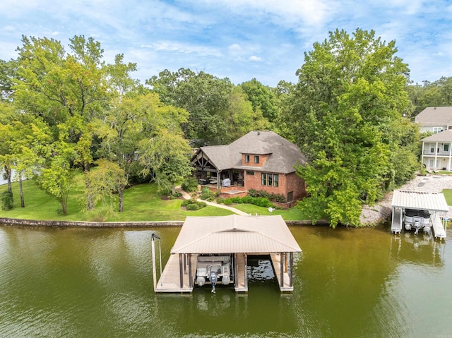 view of dock featuring a yard and a water view