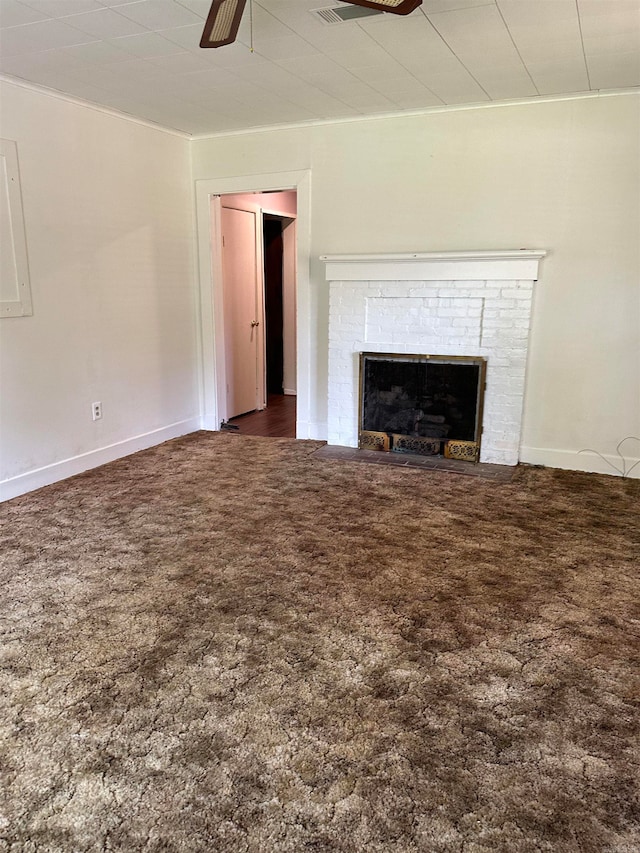 unfurnished living room with carpet, ceiling fan, and a fireplace