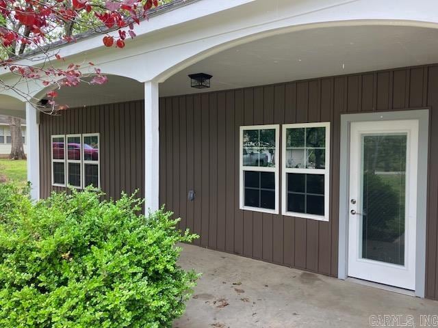 doorway to property featuring a patio