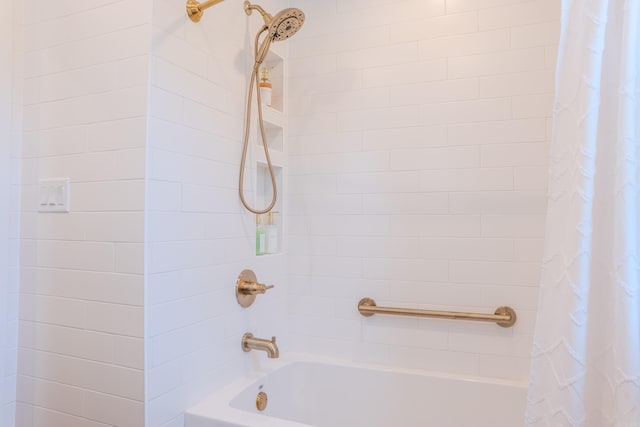 bathroom with shower / bath combination with curtain