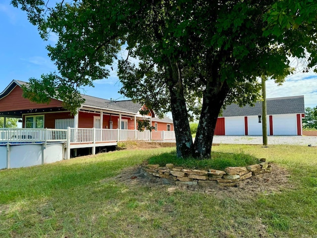 view of yard with a garage