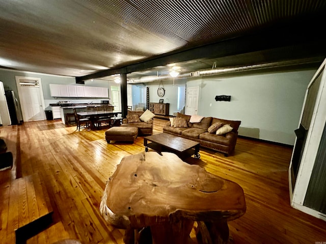 living area with wood-type flooring