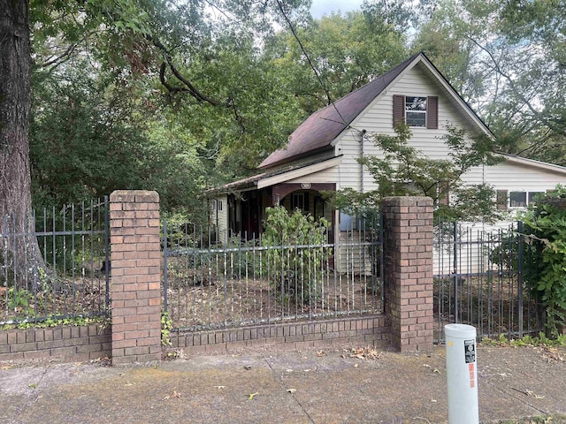 view of gate featuring a fenced front yard
