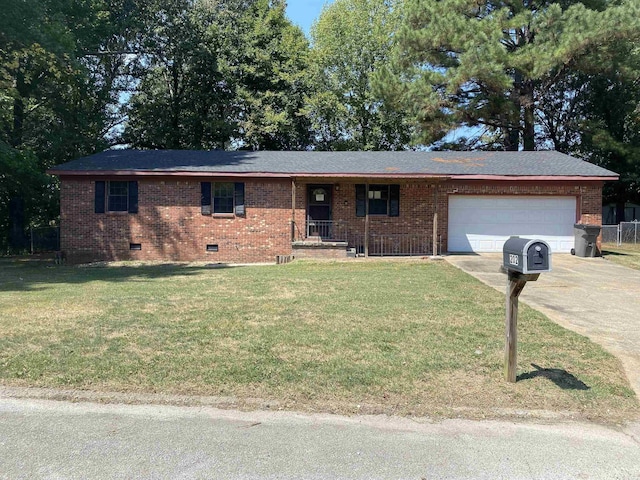 ranch-style house with a front lawn, concrete driveway, a garage, crawl space, and brick siding