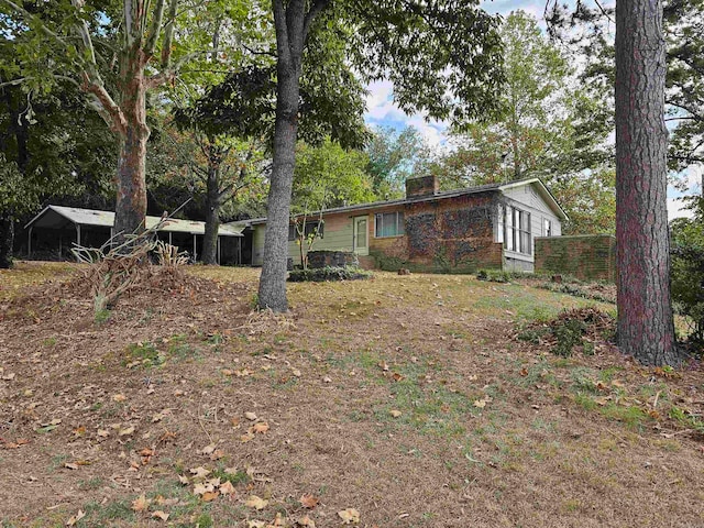 view of front of house featuring a carport